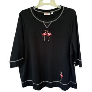 Quacker Factory embroidered French terry sweatshirt featuring flamingo motifs.
